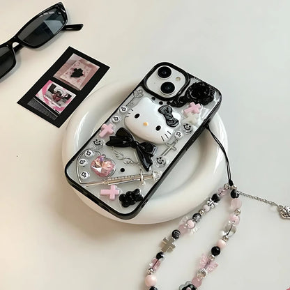 Kawaii Handmade Gothic Resin Charm Phone Case featuring a unique 3D Hello Kitty design, black and pink crosses, heart gem embellishments, gothic chains, and intricate resin detailing. Includes a free matching charm lanyard with beads, crosses, and butterfly accents. Perfect for iPhone users looking for a trendy, cute, and edgy phone case with a gothic aesthetic. Ideal for fans of kawaii and handmade accessories.